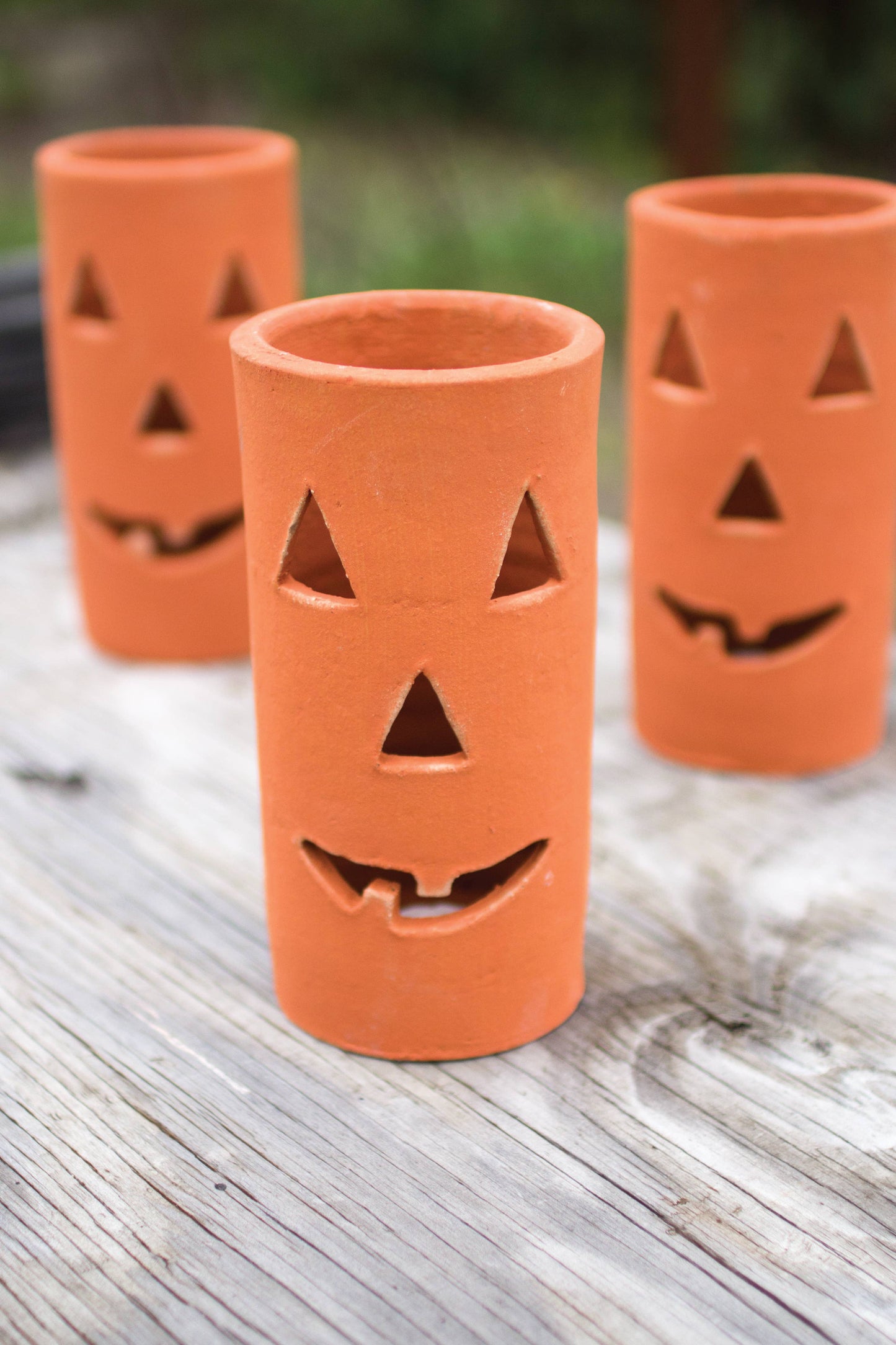 TALL TERRACOTTA  JACK-O-LANTERN: Clay / 4.5"d x 8"t